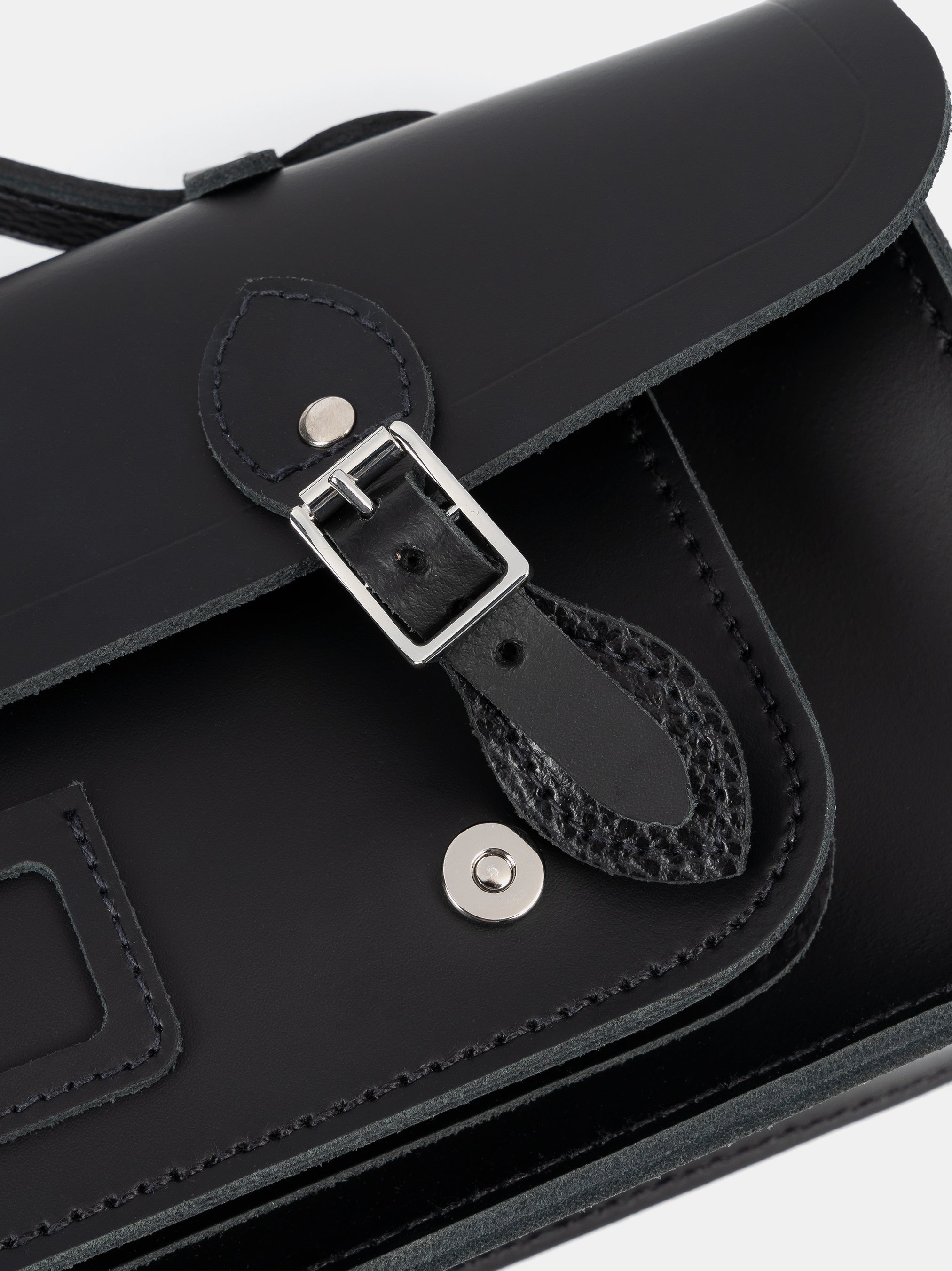 Detail shot of Long Leather Satchel with Magnetic Closure in Black