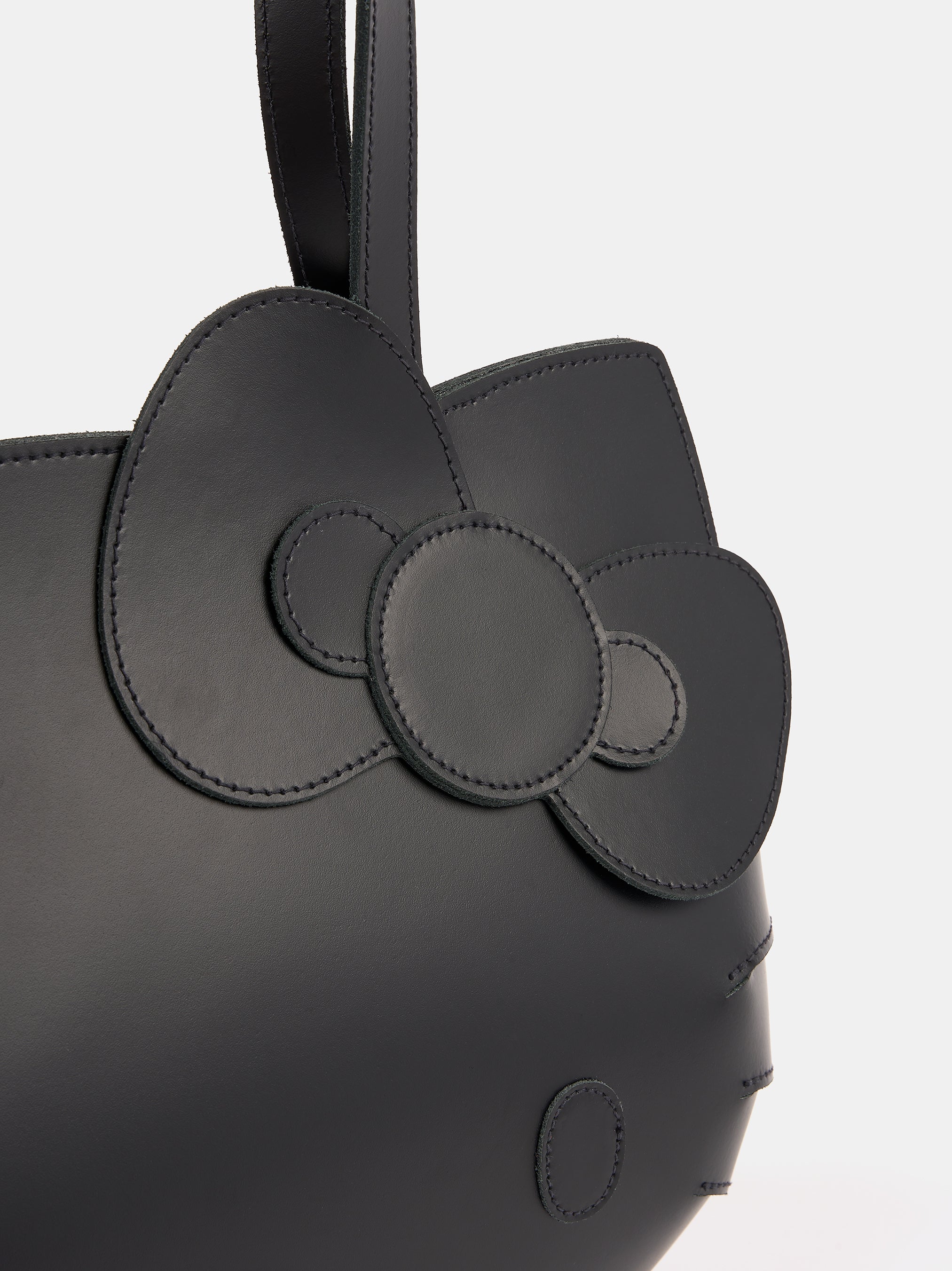 Hello Kitty Face Leather Tote Bag In Black Cambridge Satchel