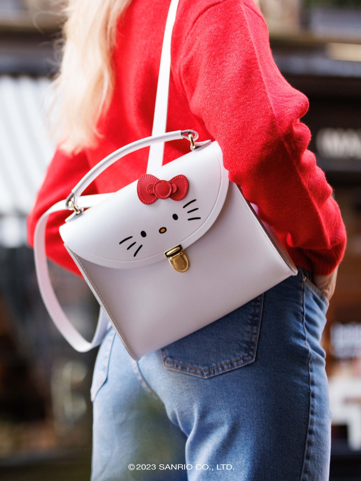 The Hello Kitty Poppy Leather Backpack in White Cambridge Satchel
